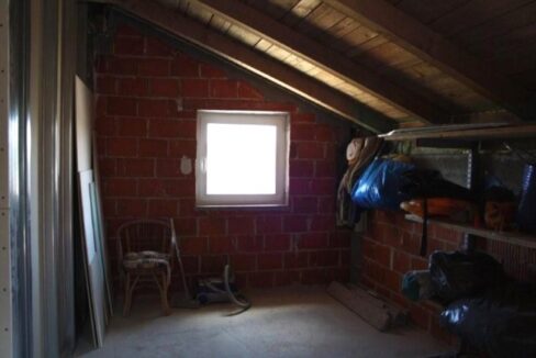 Attic floor in bare brickwork condition