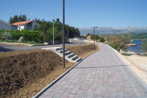 New asphalt road and promenade